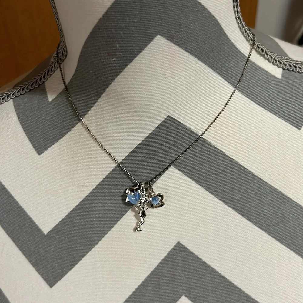 Kids 16” silver lobster clasp. Has tinker bell charm. Gently used